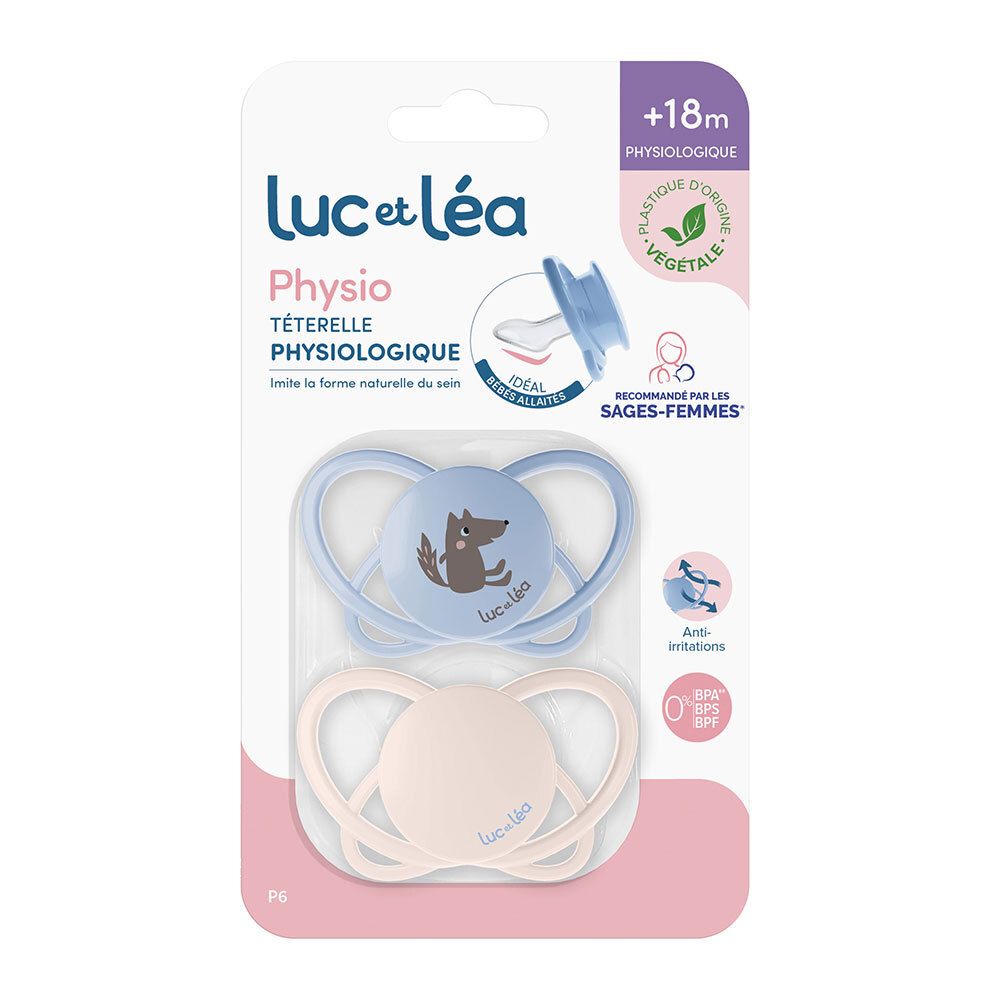 Zwei Schnuller in Blisterverpackung. Ein blauer Schnuller mit Wolfsmotiv, ein beiger Schnuller. Marke: Luc et Léa. Altersempfehlung: +18m.
