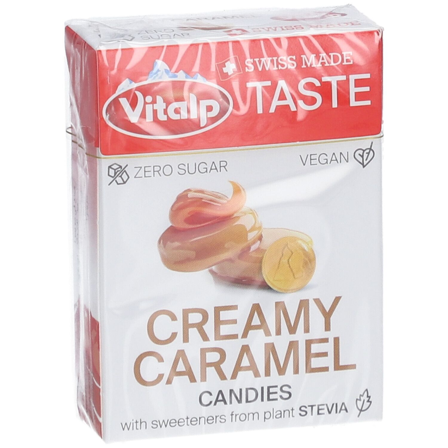 Verpackung VITALP Bonbons. Aufschrift: Creamy Caramel, ohne Zucker, vegan. Abbildung von Karamellbonbons. Swiss Made.