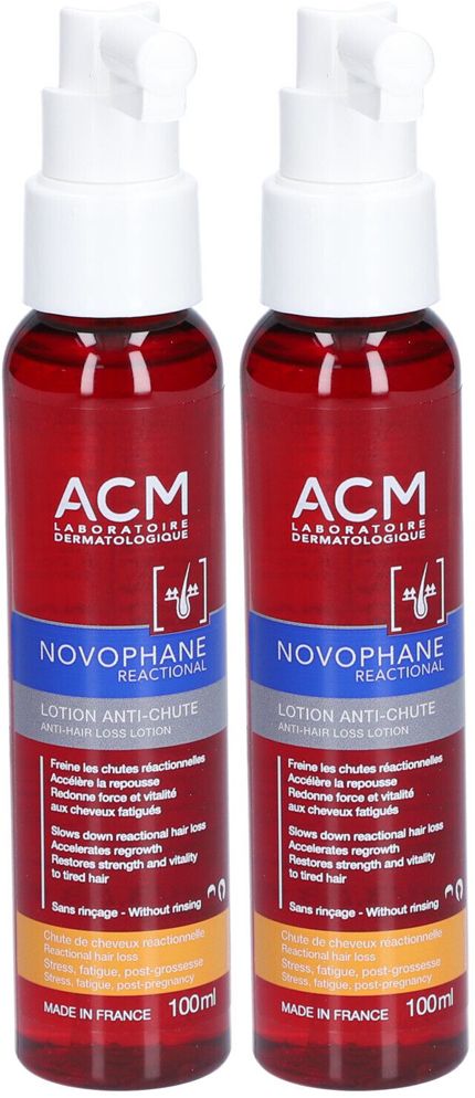 Deux flacons de lotion rouge. Inscription: ACM Novophane Reactional Lotion Anti-chute. Têtes de pulvérisation blanches.