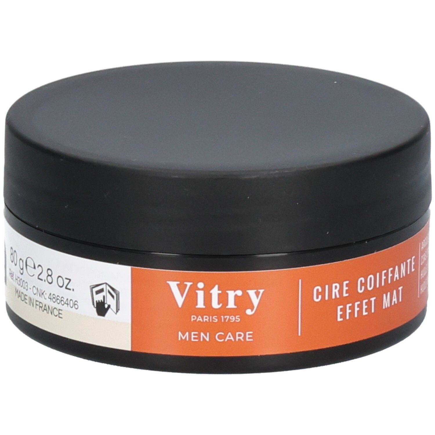 Runde, schwarze Dose mit orangefarbenem Etikett. Auf dem Etikett steht "Vitry PARIS 1795 MEN CARE". Text: "CIRE COIFFANTE EFFET MAT".