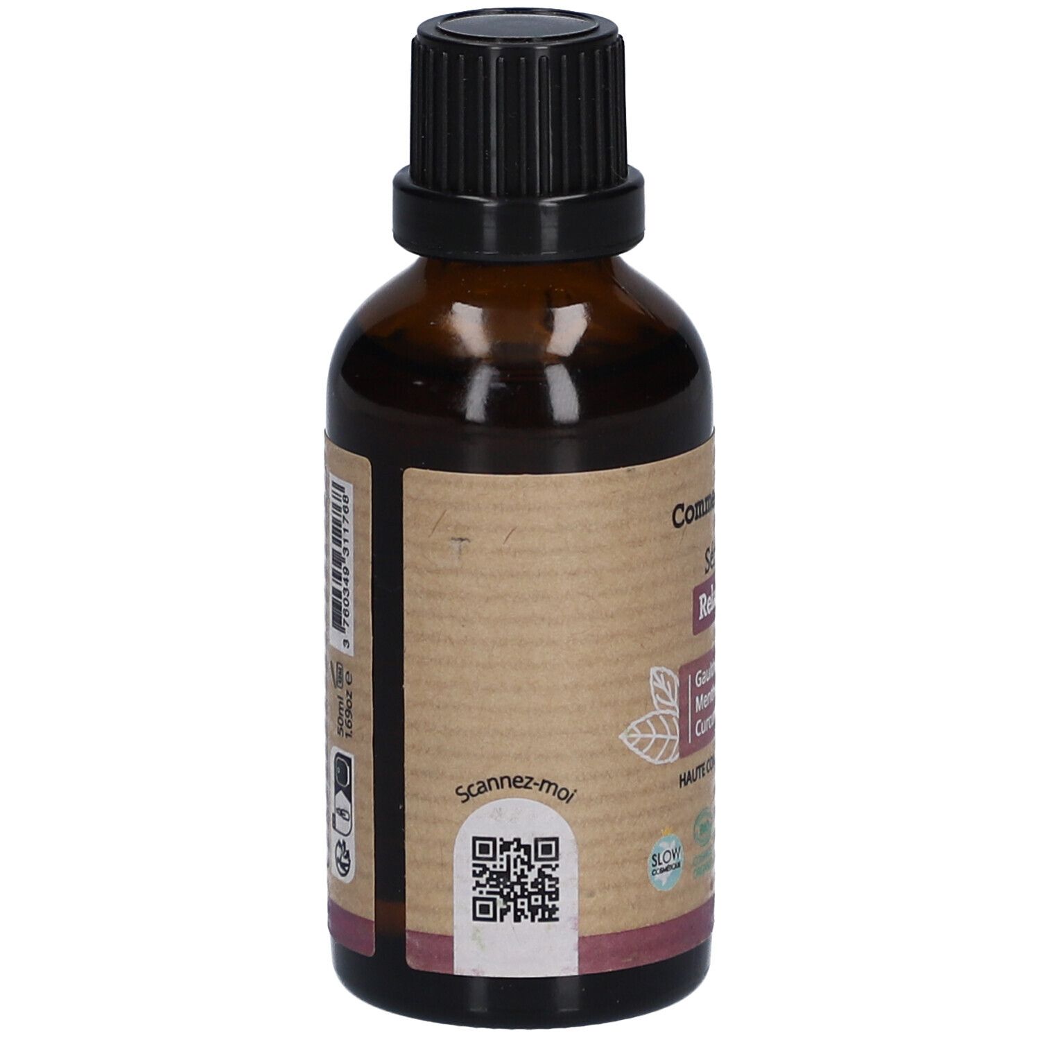 Rückseite einer braunen Glasflasche. Etikett mit QR-Code und Text. "Comme Avant" und "Sérum Relaxant".