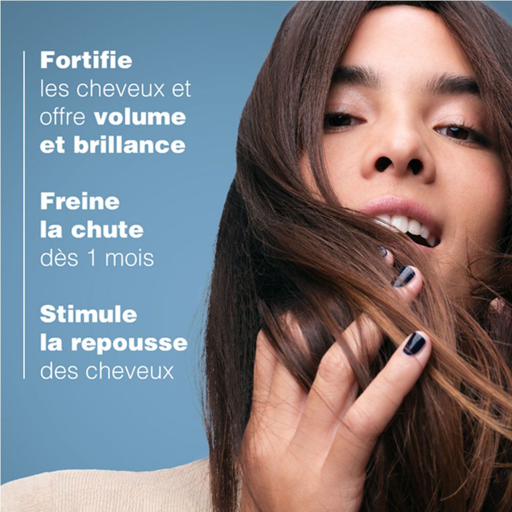 Femme avec cheveux. Texte : Fortifie les cheveux, volume, brillance, freine la chute, stimule la repousse.