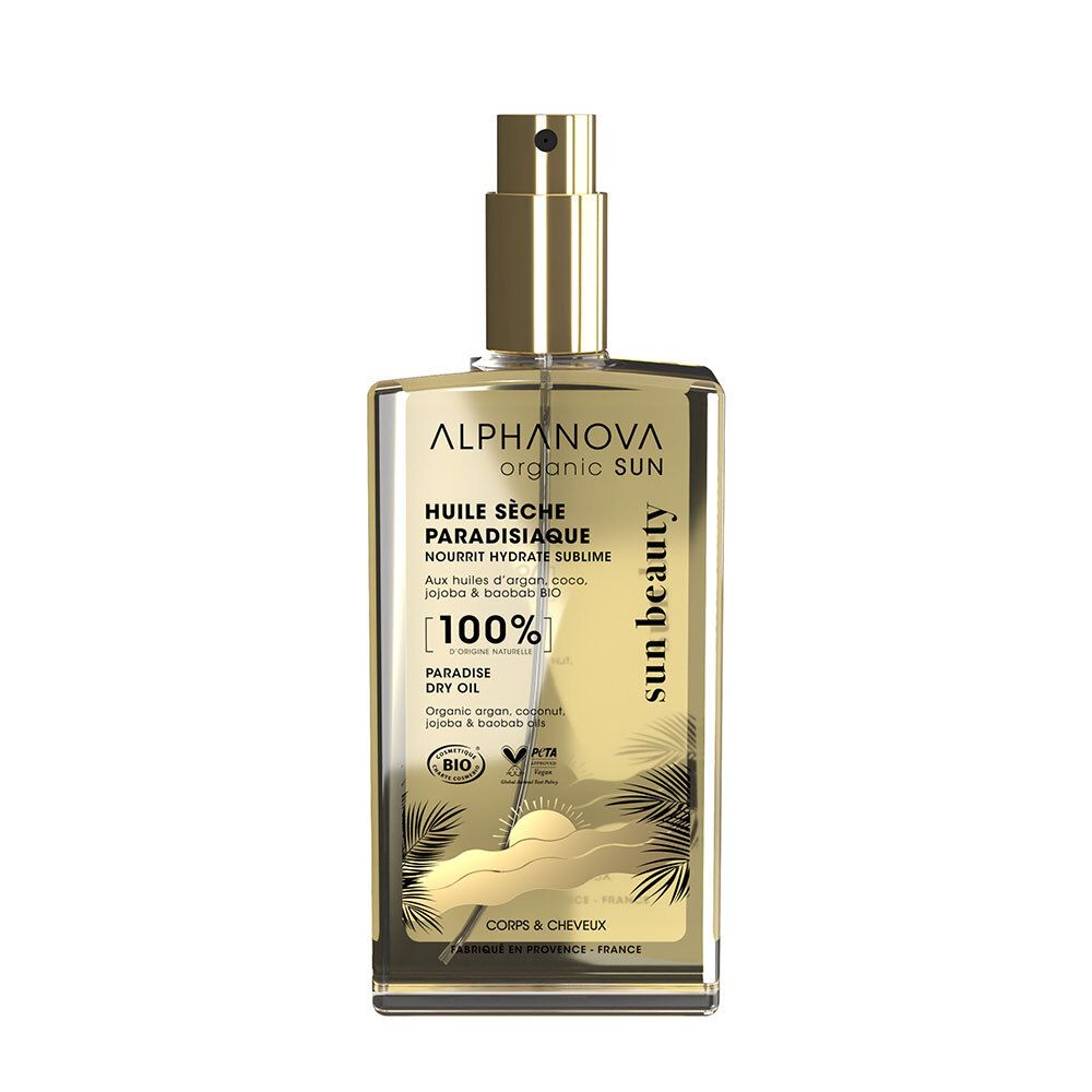ALPHANOVA Trockenöl-Flakon. Goldener Sprühkopf, transparente Flüssigkeit. Aufschrift: Huile Sèche Paradisiaque, 100%.