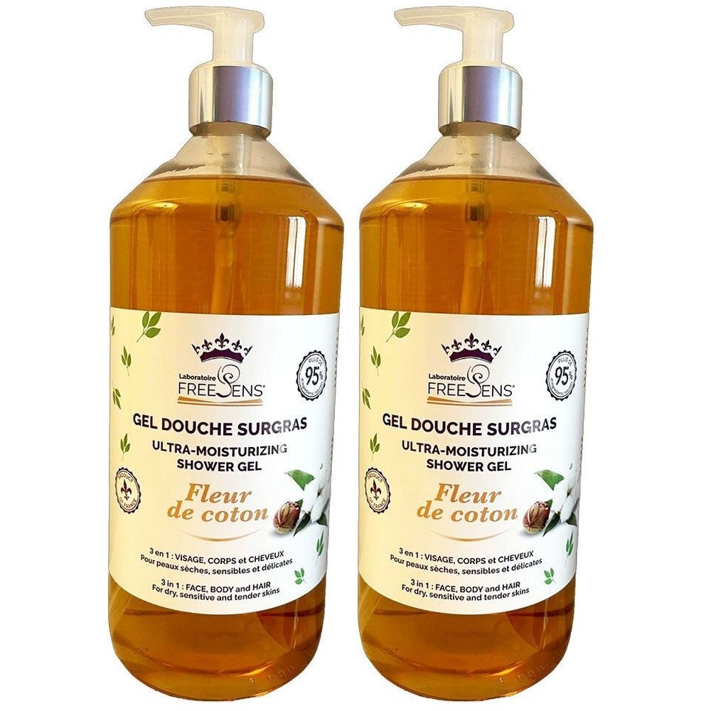 Deux flacons de gel douche avec pompe. Inscription: FREESENS, Gel Douche Surgras, Fleur de coton. 95% ingrédients d'origine naturelle.