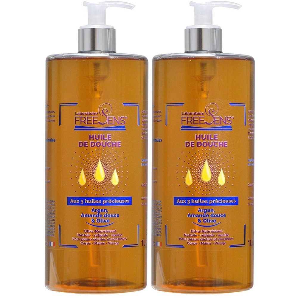 Deux flacons d'huile de douche avec pompe doseuse. Inscription: FREE SENS, Huile de Douche, avec Argan, Amande et Olive.