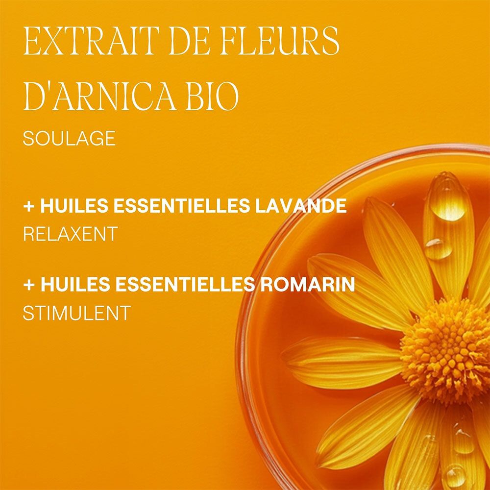 Nahaufnahme von gelben Blüten in Flüssigkeit. Text: Arnika-Blütenextrakt, ätherische Öle.