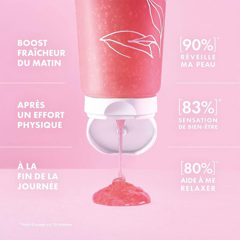 Nahaufnahme des Duschgels. Rosa Gel fließt aus der Tube. Text: Boost Frische, Après un effort physique, À la fin de la journée.