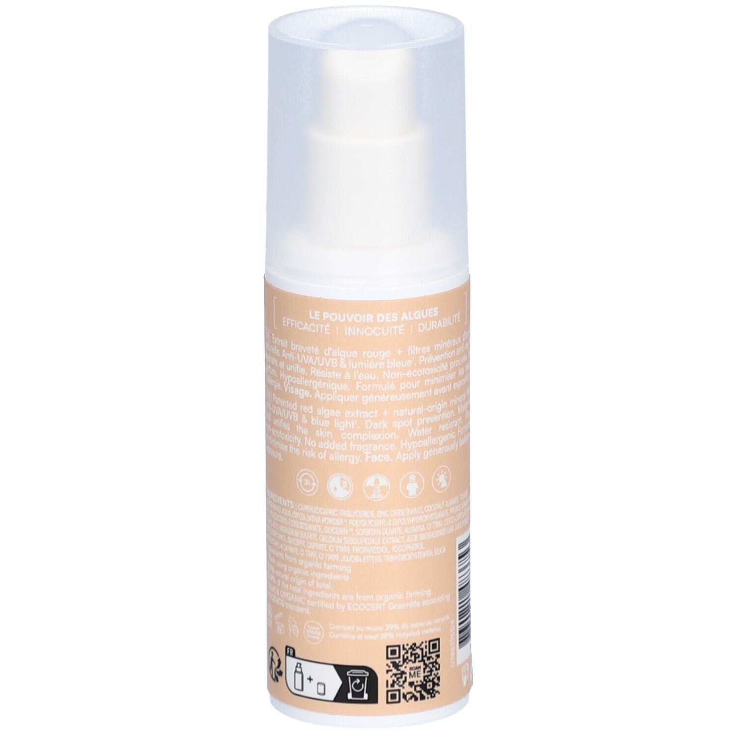Dos du flacon de crème solaire teintée. Informations textuelles et logos. Fond beige.