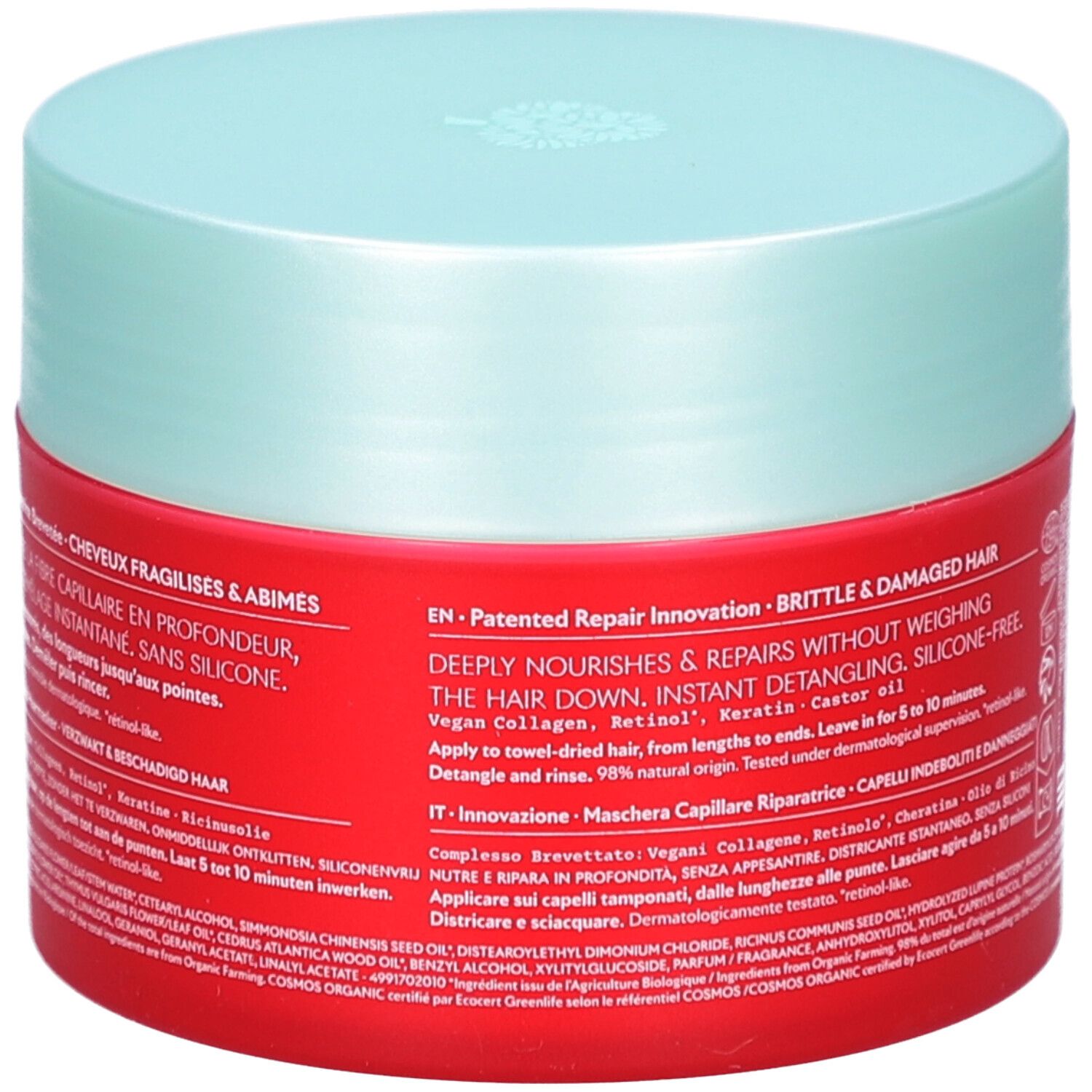 Pot rouge avec couvercle bleu clair. Dos avec texte. Contient des informations sur l'utilisation et les ingrédients.