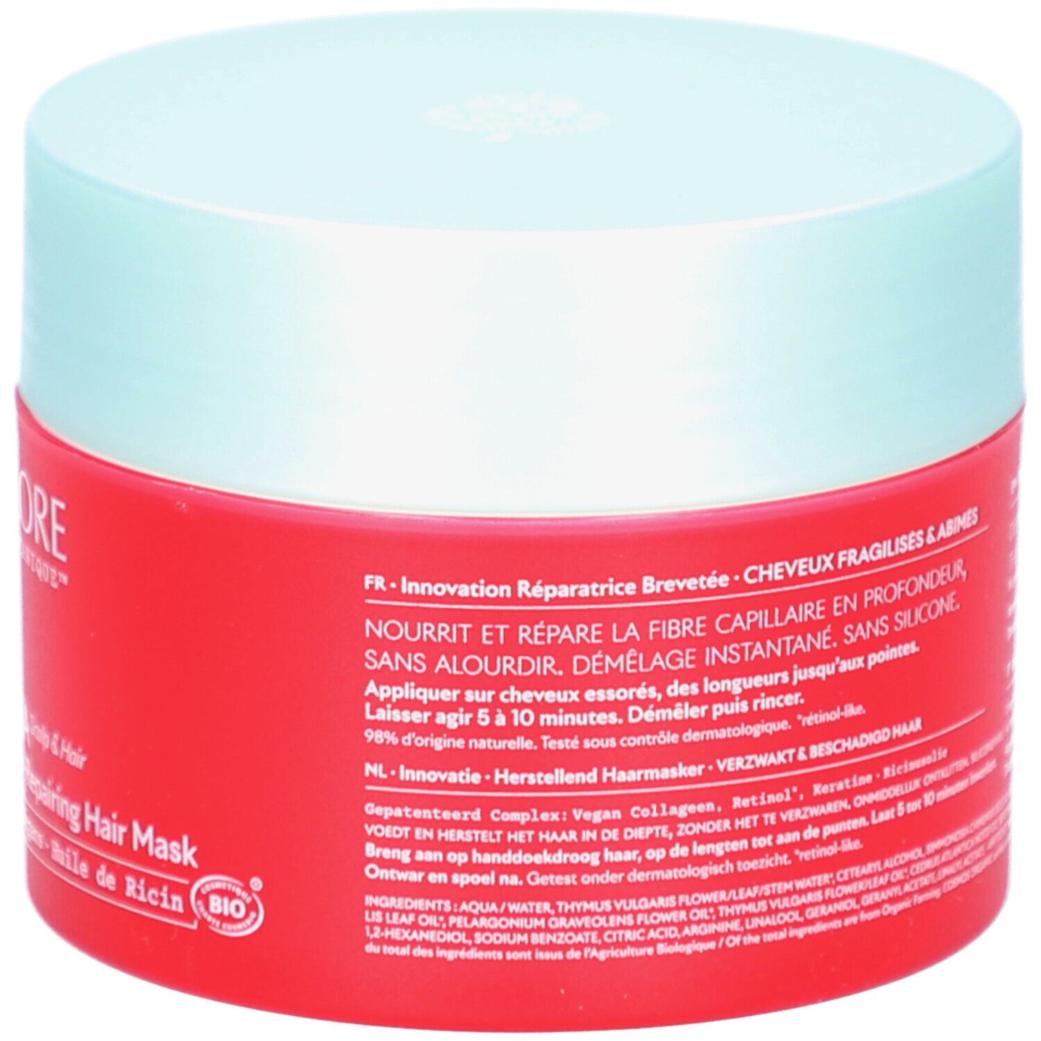 Pot rouge avec couvercle bleu clair. Dos avec texte. Contient des informations sur l'utilisation et les ingrédients.