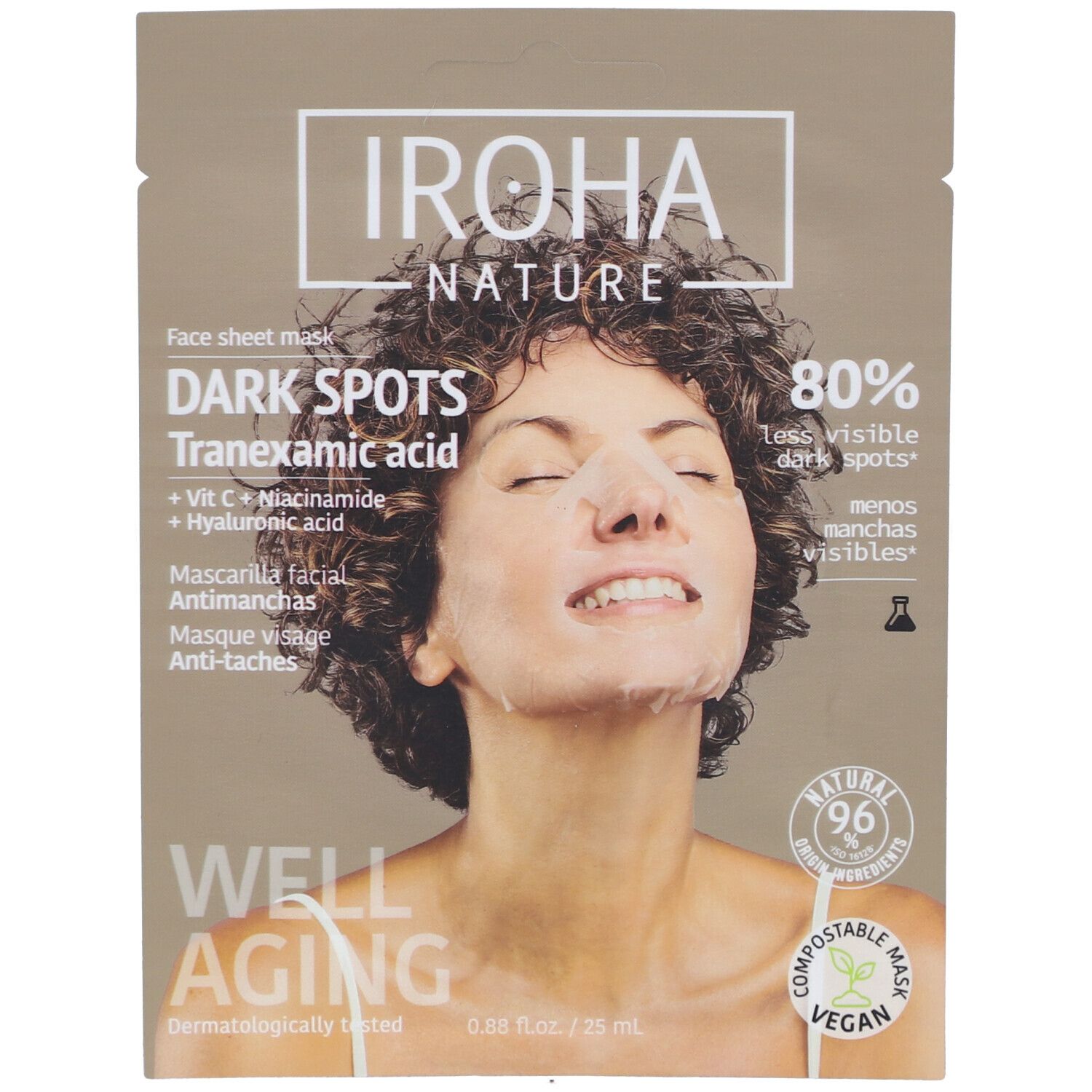 Masque visage IROHA NATURE sur femme. Texte: DARK SPOTS, acide tranexamique, vitamine C, acide hyaluronique. Vegan, compostable.
