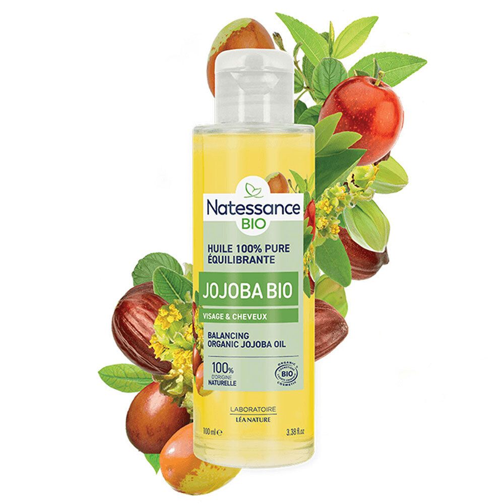 SO BIO ETIC Natessance Jojoba Bio Ölflasche. Grünes Etikett. Abbildung von Jojoba-Früchten und Blättern. Klarer Inhalt.