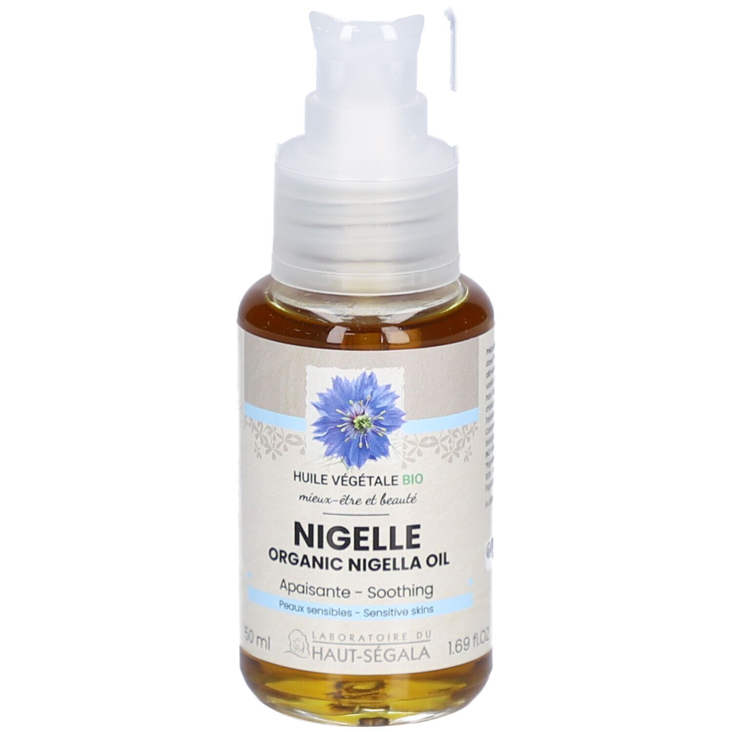 Flacon de liquide brun avec pompe. Inscription: Nigelle Organic Nigella Oil. Label: Laboratoire du Haut-Ségala.