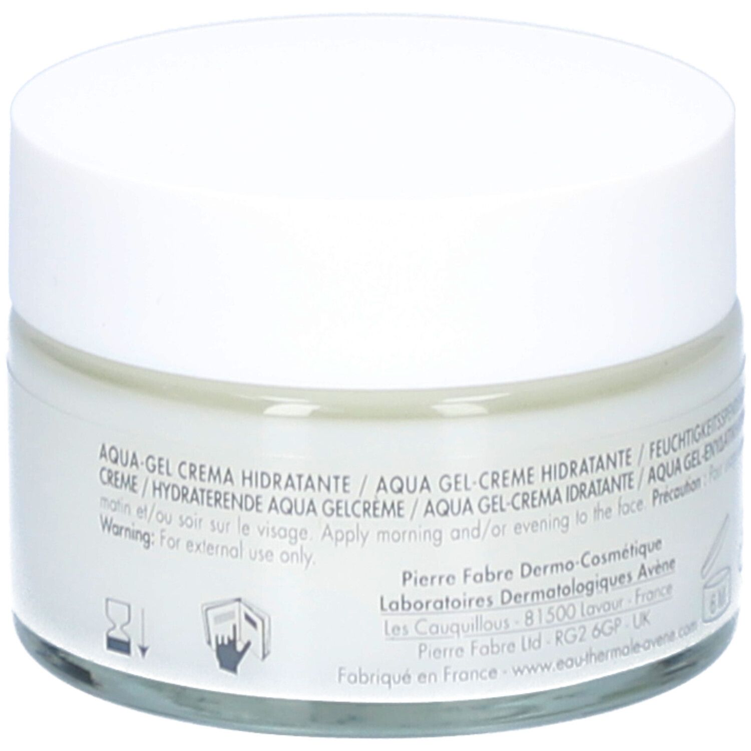 Dos d'un pot de crème avec couvercle blanc. Texte multilingue. Symbole 6M.