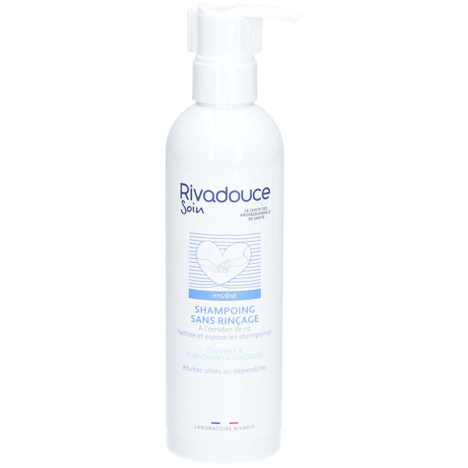 Flacon blanc avec pompe. Inscription: RIVADOUCE Soin, Shampoing Sans Rinçage. Produit d'hygiène pour adultes et personnes dépendantes.