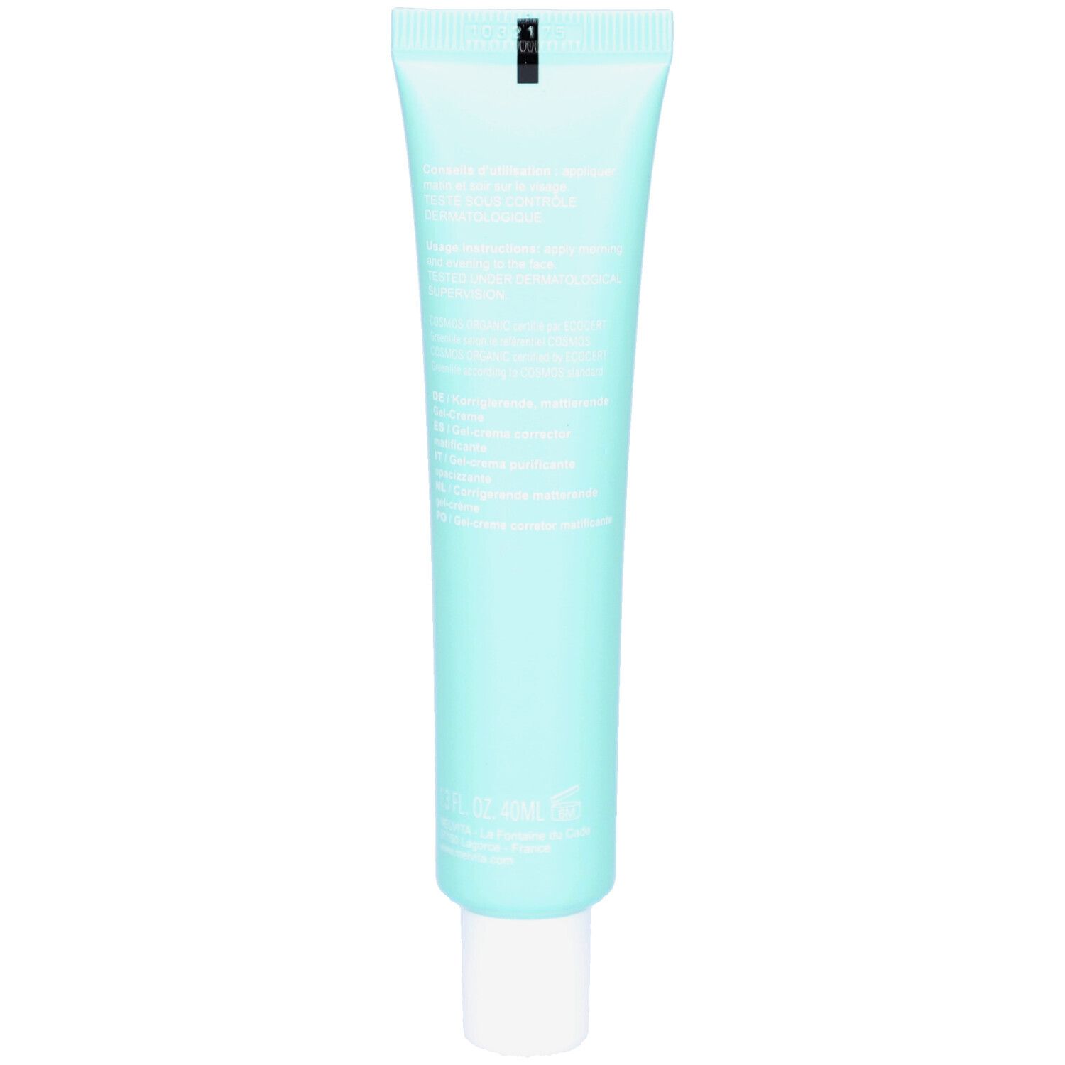 Dos d'un tube bleu clair. Texte en plusieurs langues. En bas : 30 ml, fabriqué en France.