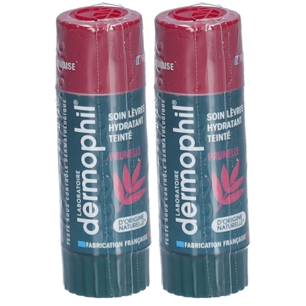 Deux sticks de baume à lèvres emballés. Capuchon rouge foncé, corps vert. Inscription: dermophil, Soin Lèvres Hydratant Teinté.