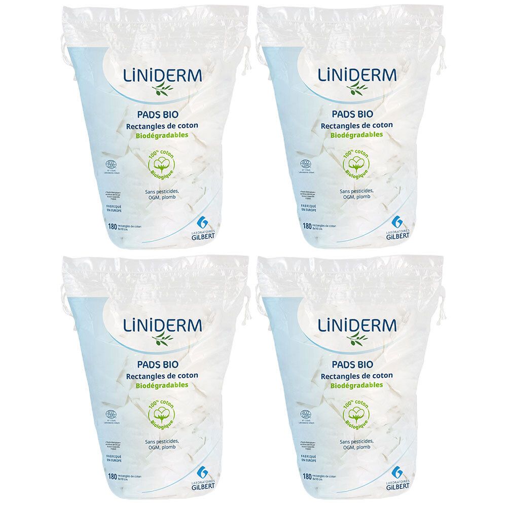 Vier Packungen Pads Bio. Jede Packung trägt die Aufschrift LİNİDERM, PADS BIO, Rectangles de coton, und Biodegradables.