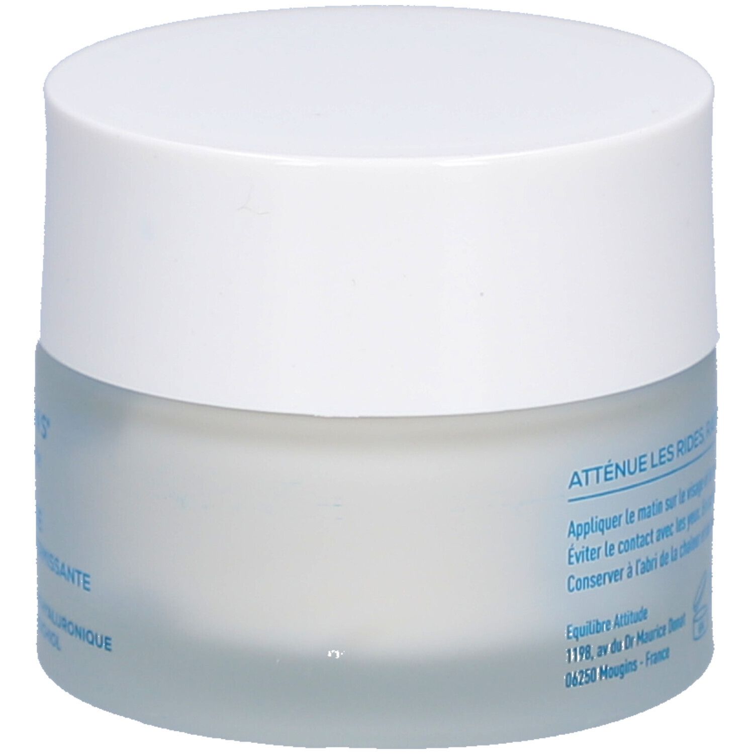 Creme-Tiegel mit weißem Deckel. Rückseite mit Text: Atténue les rides, raffermit et hydrate la peau. Fabriqué en France.