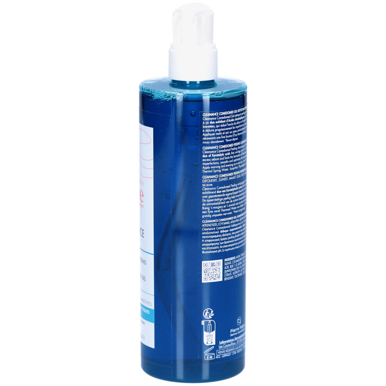 Vue arrière du flacon bleu. Texte sur l'étiquette. Pompe blanche.