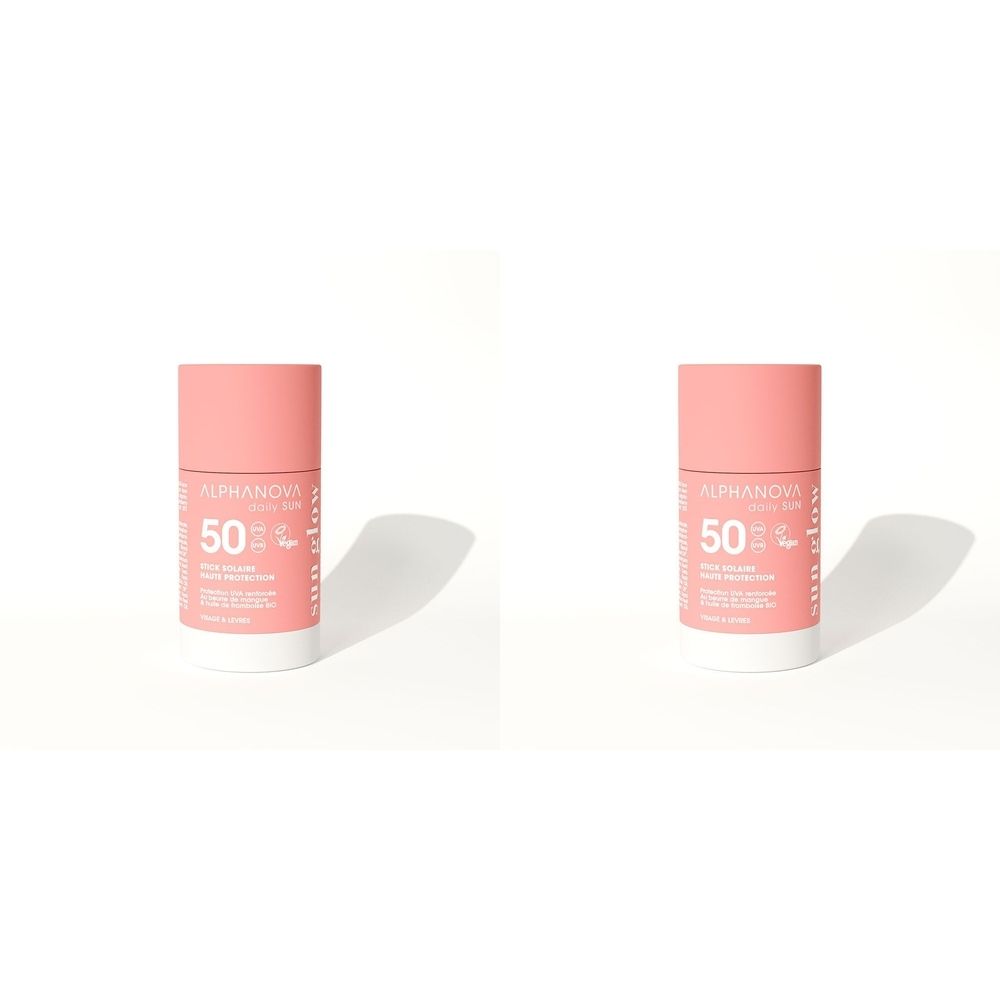 Zwei Sonnenstifte mit rosa Kappe und weißem Boden. Aufschrift: Alphanova, SPF 50.
