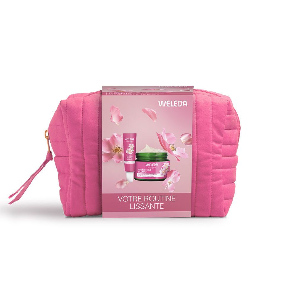 Rosa Kosmetiktasche mit Produkten. Aufdruck: WELEDA, Votre Routine Lissante. Enthält Creme und Lippenbalsam.