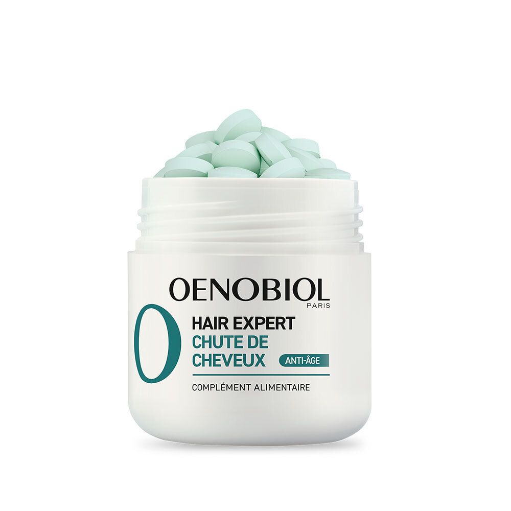 Behälter mit grünen Tabletten. Aufschrift: OENOBIOL Hair Expert Chute de Cheveux. Anti-Age. Nahrungsergänzungsmittel.