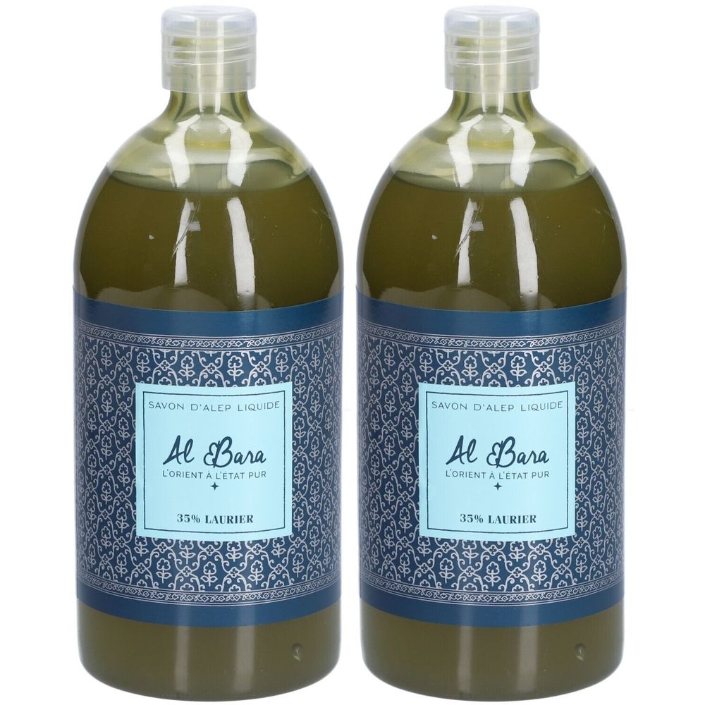 Deux bouteilles de liquide vert. Étiquettes avec "SAVON D'ALEP LIQUIDE", "Al Bara", "35% LAURIER". Bouchons blancs.