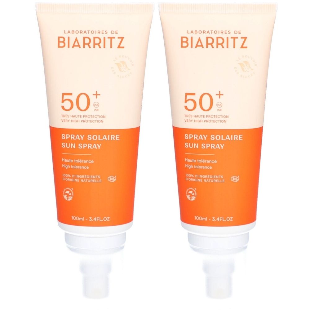 Zwei Tuben Sonnenspray mit SPF 50+. Aufschrift: Laboratoires de Biarritz, Spray Solaire Sun Spray. Weiße Tube mit orangefarbenem Abschnitt.