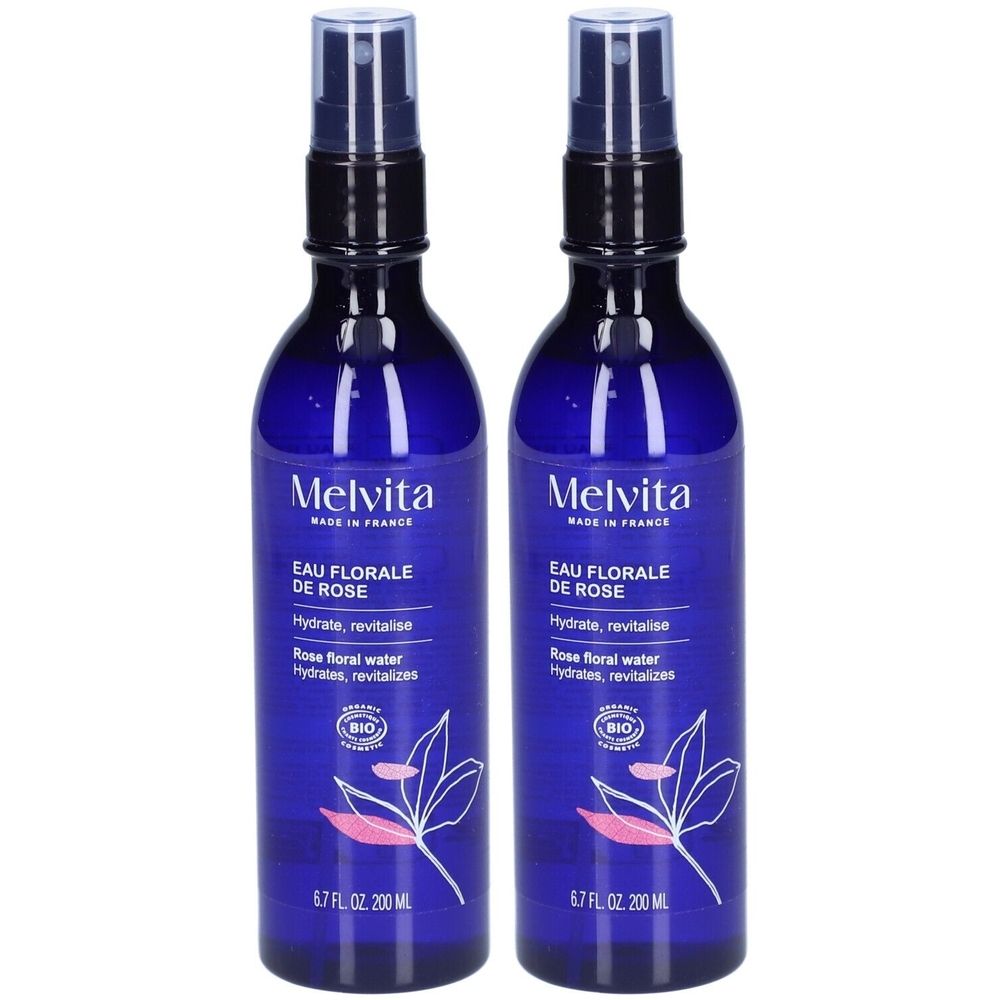 Deux flacons bleus avec vaporisateur. Inscription: Melvita, Eau Florale de Rose. Contient une certification bio. 6.7 FL. OZ. 200 ML.