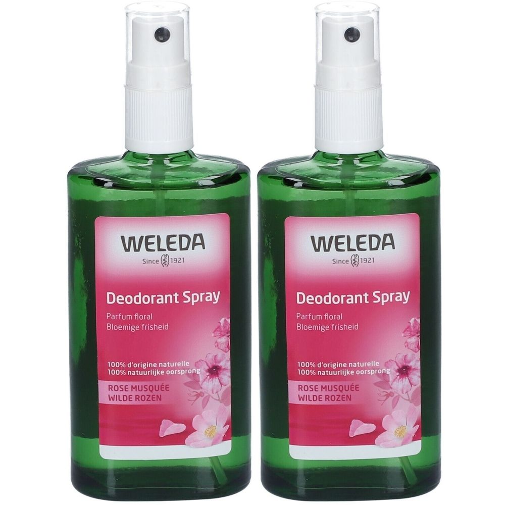 Deux flacons en verre vert avec vaporisateur blanc. L'étiquette indique "WELEDA Deodorant Spray".