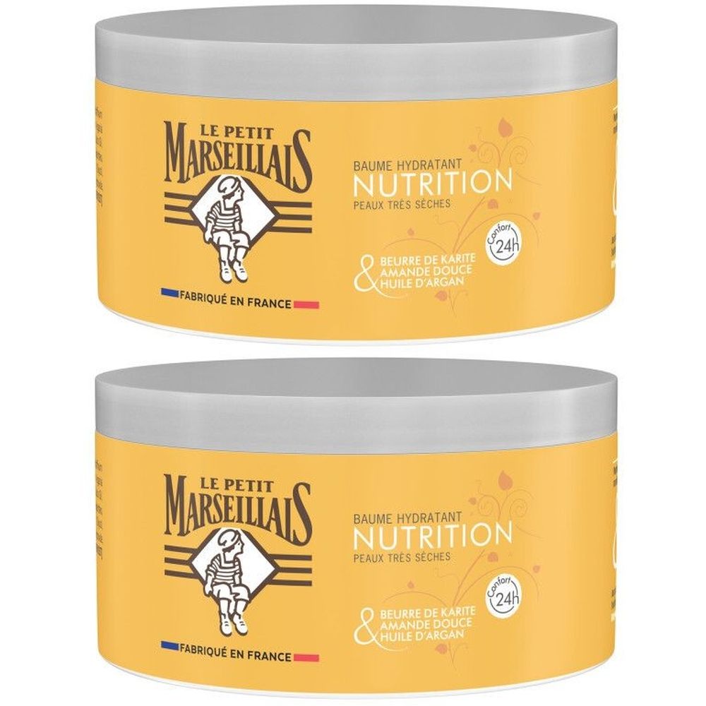 Deux pots crème avec couvercles. Inscription: Le Petit Marseillais, Baume Hydratant Nutrition. Beurre de Karité, Amande Douce, Huile d'Argan.