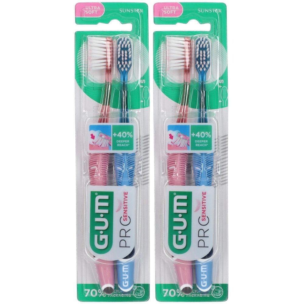 Deux brosses à dents sous blister. Manches roses et bleus, soies blanches et bleues. G•U•M PRO SENSITIVE. Ultra Soft.