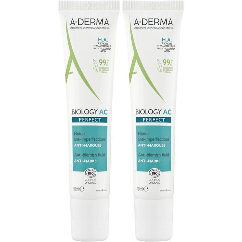 Deux tubes de A-DERMA BIOLOGY AC PERFECT. Tubes blancs avec texte et logo verts. Contient de l'acide hyaluronique. Certification bio.