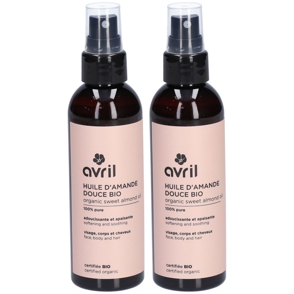 Deux flacons d'huile d'amande douce Avril. Flacons en verre brun avec vaporisateur. Inscription : Huile d'Amande Douce Bio, certifié Bio.