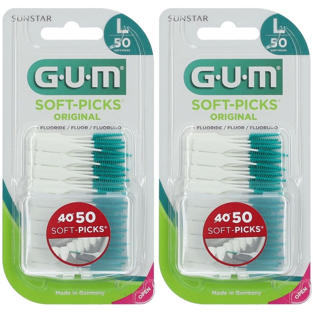 Deux paquets de GUM Soft-Picks Original. Chaque paquet contient 50 pièces. Têtes de brosse vertes et blanches dans des boîtes transparentes.