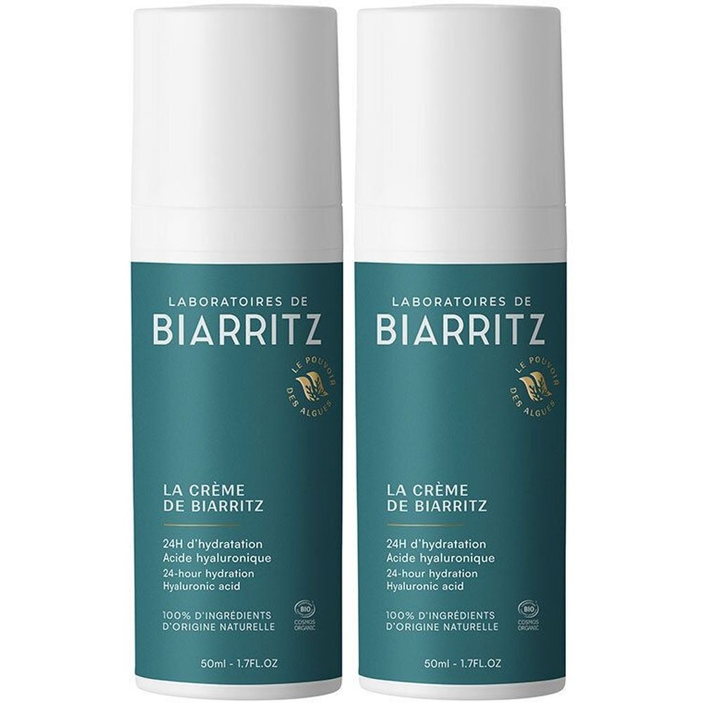 Zwei weiße und grüne Flaschen. Aufschrift: LABORATOIRES DE BIARRITZ, La Crème de Biarritz, 24H Hydratation, Hyaluronsäure.