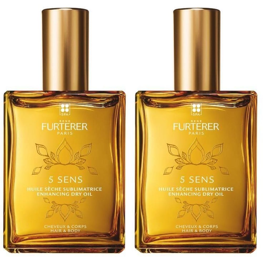 Deux flacons d'huile dorée. Inscription : René Furterer, 5 SENS, Huile sèche sublimatrice, Enhancing Dry Oil. Pour cheveux et corps.