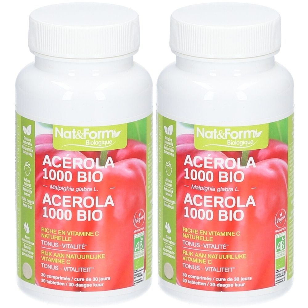 Deux flacons blancs avec étiquettes. Inscription : ACÉROLA 1000 BIO. Fond rouge, accents verts. Label Vegan.
