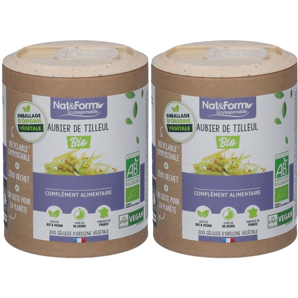 Deux boîtes cylindriques. Inscription: Aubier de tilleul Bio, complétée par des feuilles vertes et des logos. Certifications vegan et bio.