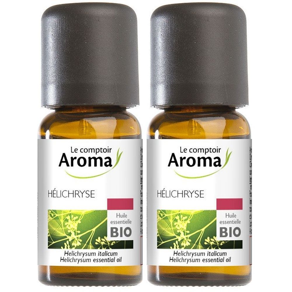 Deux flacons en verre brun avec bouchon noir. Étiquette avec texte: Helichryse, BIO, Helichrysum italicum.