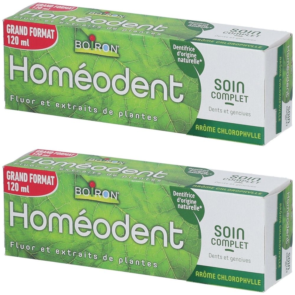 Deux boîtes de dentifrice Homéodent. Inscription : Grand Format, 120 ml, Boiron. Design vert et blanc avec des feuilles.