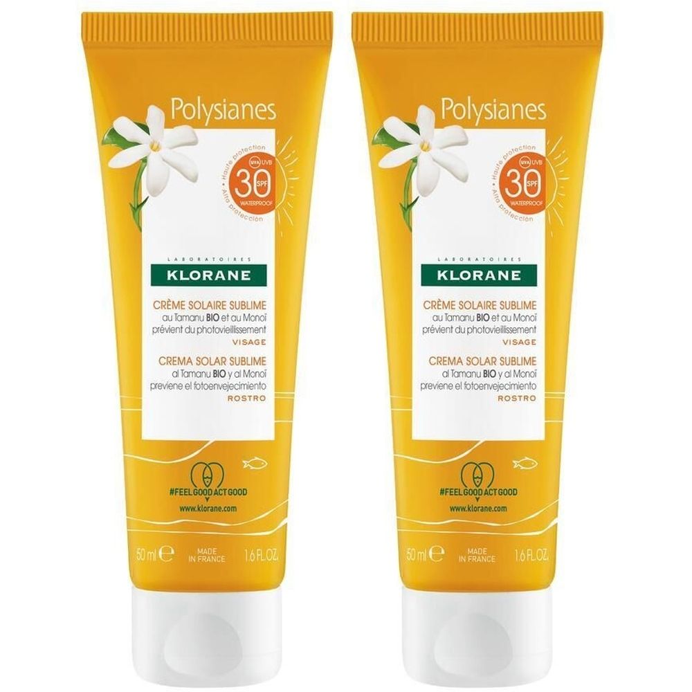 Deux tubes de KLORANE Crème Solaire Sublime. Tubes jaunes avec bouchon blanc. Inscription : SPF30, Crème Solaire Sublime, Visage.