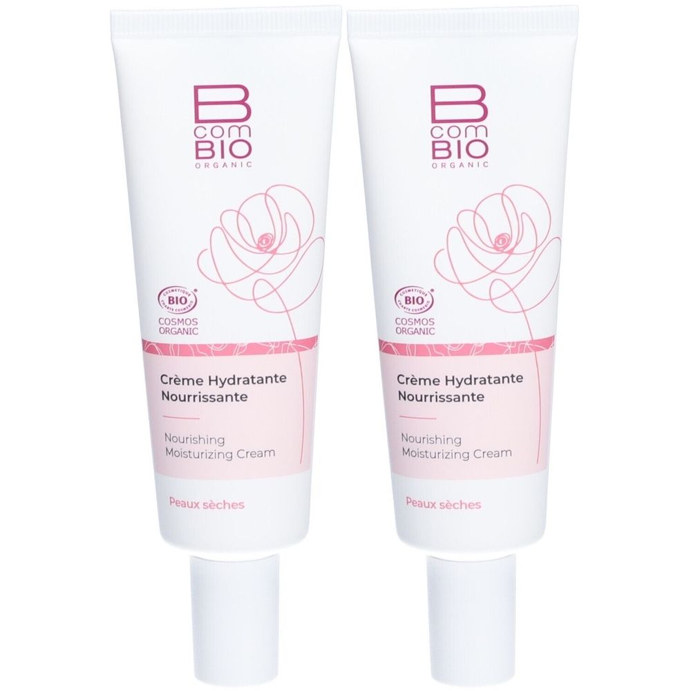 Deux tubes de crème. Inscription: B com BIO, Crème Hydratante Nourrissante, Cosmos Organic. Tubes blancs avec accents roses et motif floral.