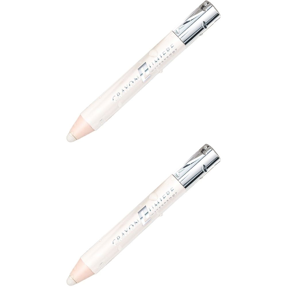 Zwei weiße Kajalstifte mit silbernen Kappen. Auf den Stiften steht "CRAYON FINI". Die Spitze ist hellrosa.