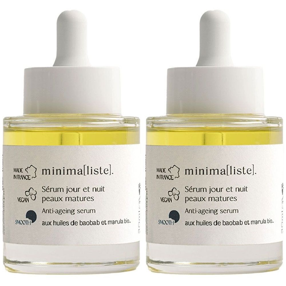 Zwei Glasflaschen mit weißem Etikett. Aufschrift: minima[liste], Sérum jour et nuit peaux matures, Anti-ageing serum. Mit Pipette.