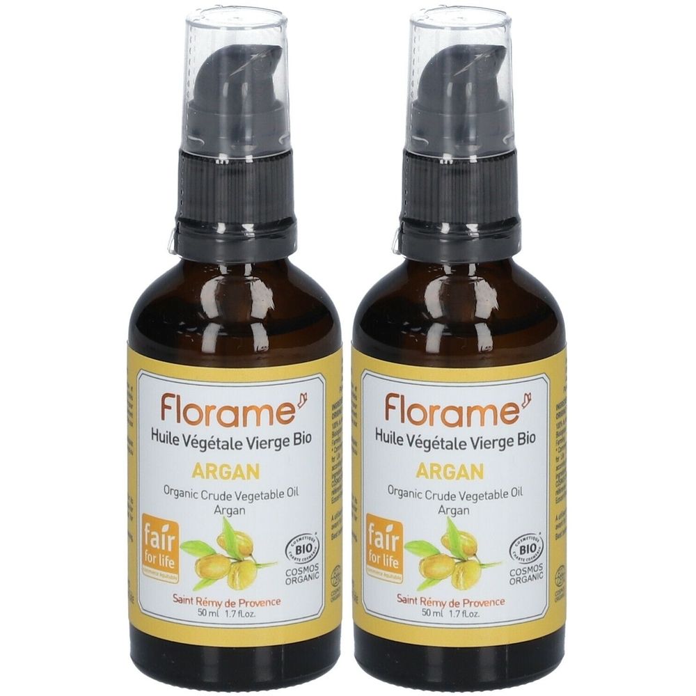 Deux flacons en verre brun avec bouchon pompe noir. Étiquettes avec "Florame Huile Végétale Vierge Bio Argan" et labels.