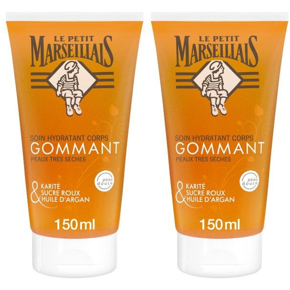 Deux tubes de gommage corporel. Emballage orange avec texte et logo. Contient karité, sucre roux et huile d'argan. 150ml.