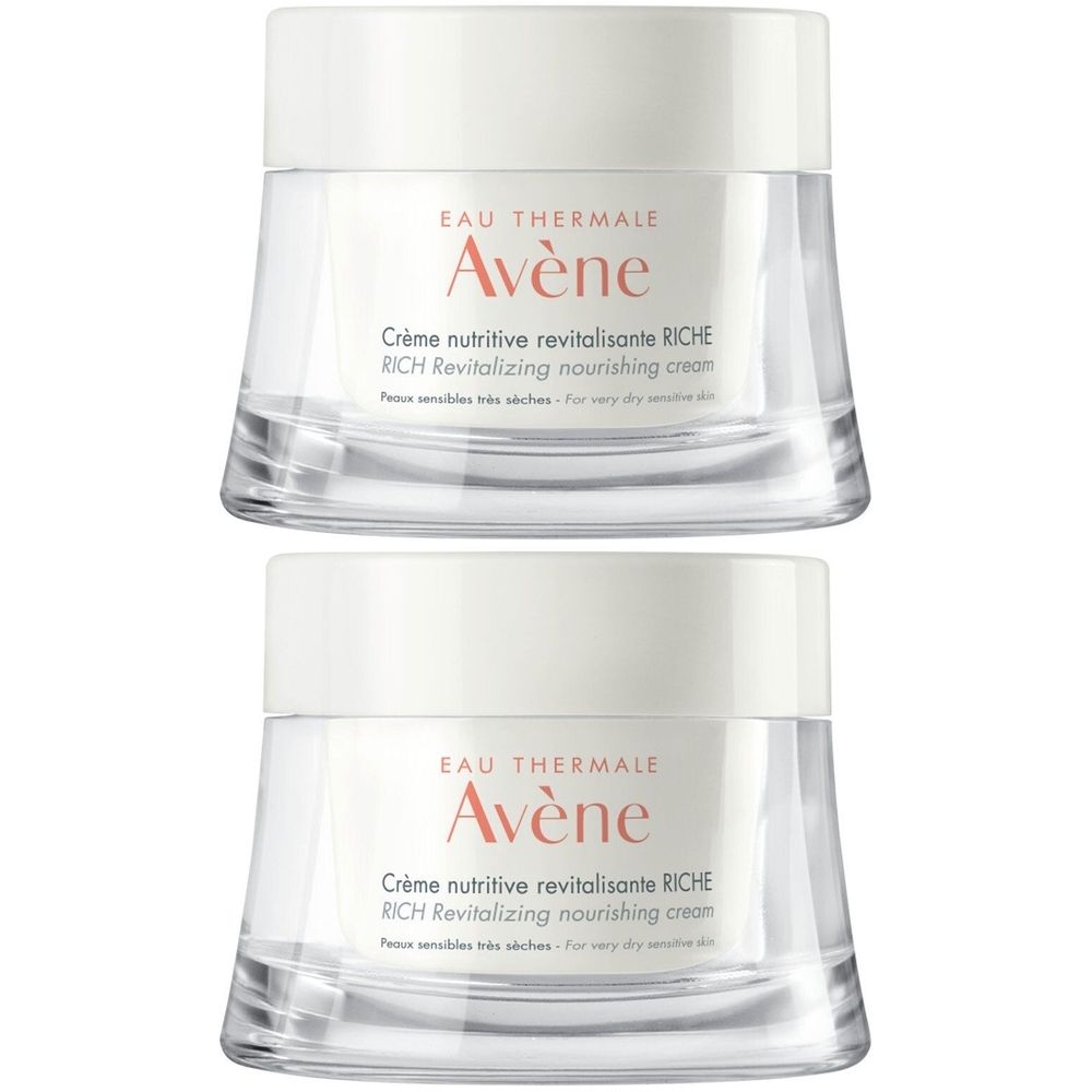 Deux pots de crème Avène Crème nutritive revitalisante RICHE. Couvercles blancs, pots transparents. Texte: Avène, Crème nutritive revitalisante RICHE.
