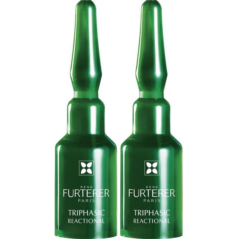 Zwei grüne Ampullen. Aufschrift: Rene Furterer Paris, Triphasic Reactional.